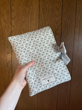 Load image into Gallery viewer, Cottage Blue Floral Quilted Bow Book Sleeve
