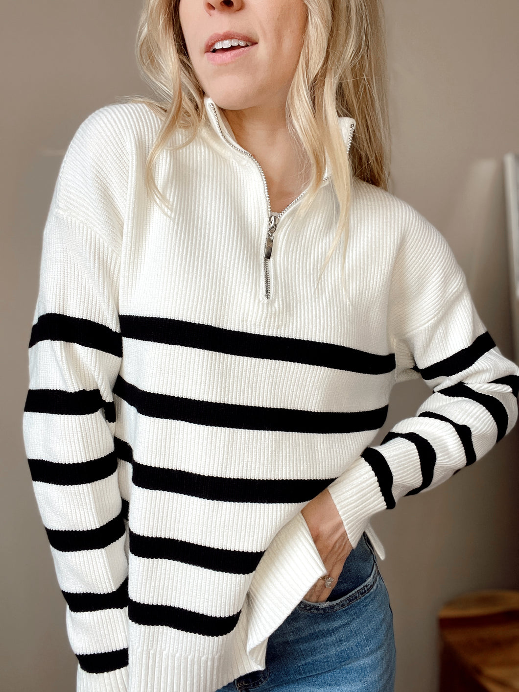 Daffie Black + White Striped Quarter Zip Sweater